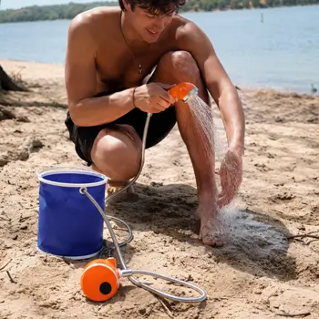 AquaTrail customer using a portable shower outdoors